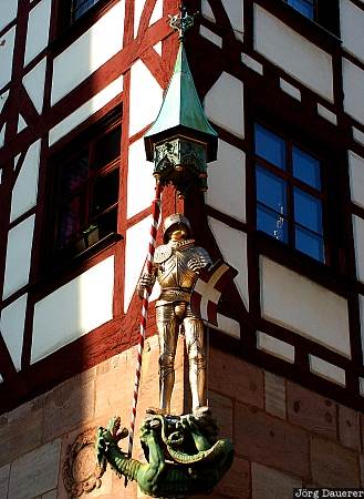 Knight in Nuremberg, Germany, Bavaria, Nuremberg, windows, roofs, sky, blue sky, half-timbered
